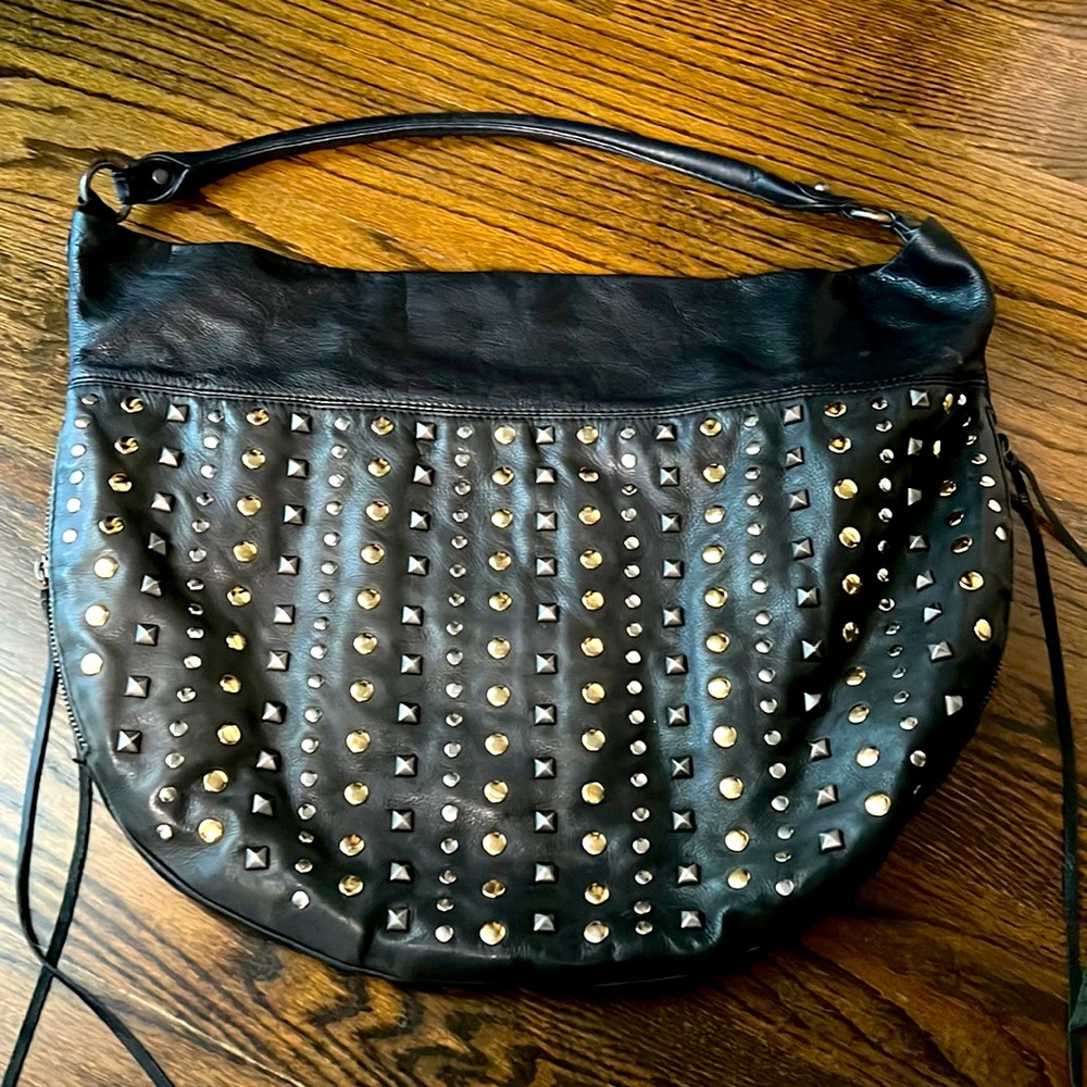 Gently used Rebecca Minkoff Bag. Black leather, silver and gold studs.